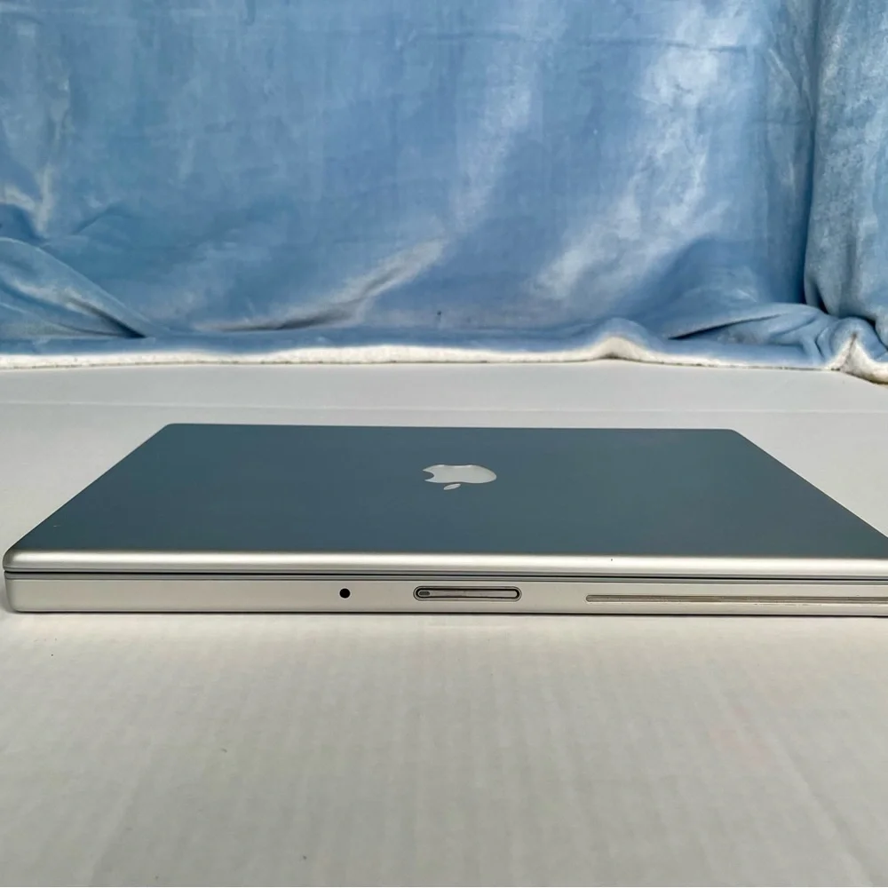 Working Apple MacBook Pro 15” laptop with adapter, 2.16 GHz Intel Core 2 Duo